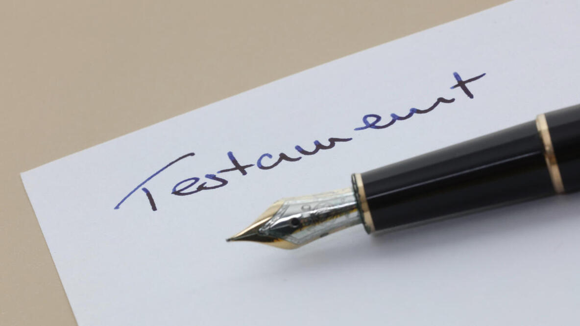 Füller auf einem Blatt Papier mit der Aufschrift Testament