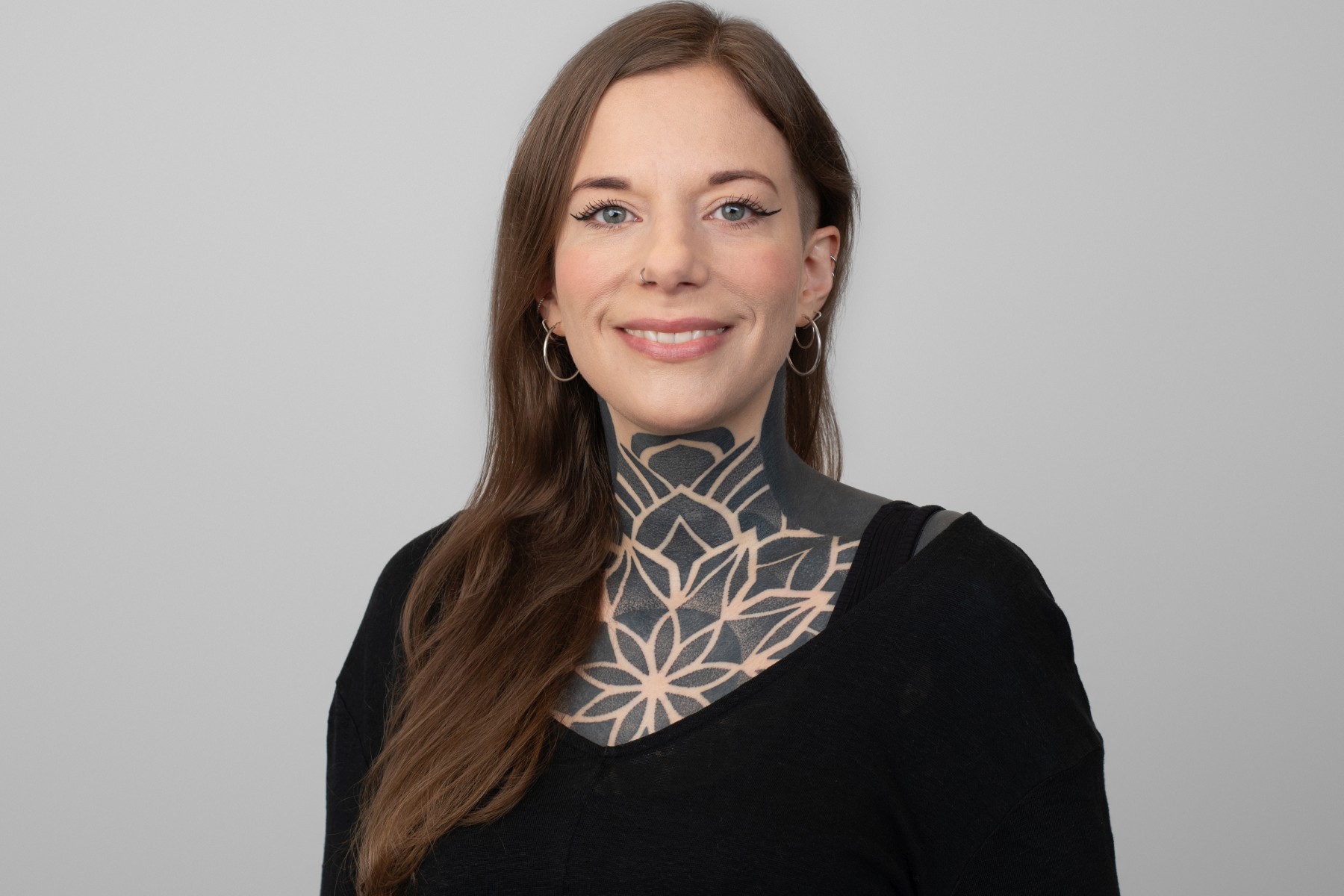 Porträtfoto von Julia Putfarcken, Mitarbeitende der Kontakt- und Informationsstelle für Selbsthilfe.